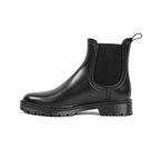 Women's black chelsea rain boots with elastic side gore and rugged lug sole