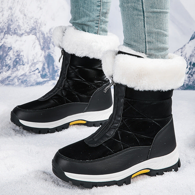 Black mid-calf zip-up snow boots with faux fur cuffs and traction lug sole.