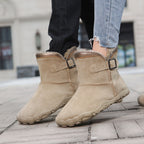 Women's winter boots, tan suede with buckle strap, faux fur trim, textured non-slip sole.
