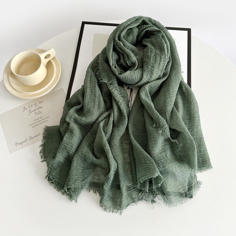 Women’s cotton scarf in army green, long crinkle gauze with frayed fringe ends