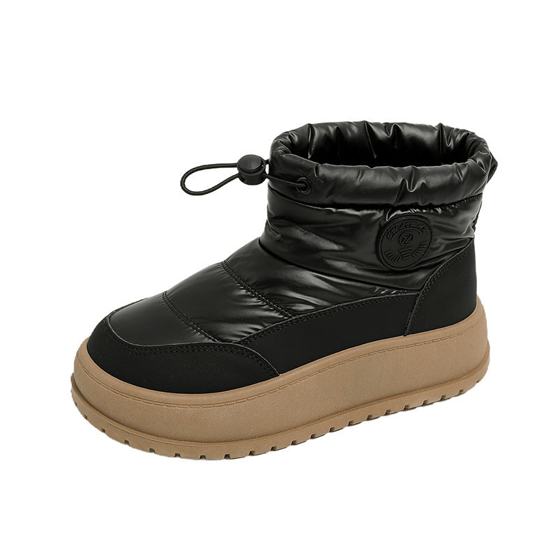 Black snow boot with quilted upper, drawstring cuff, and chunky rubber outsole
