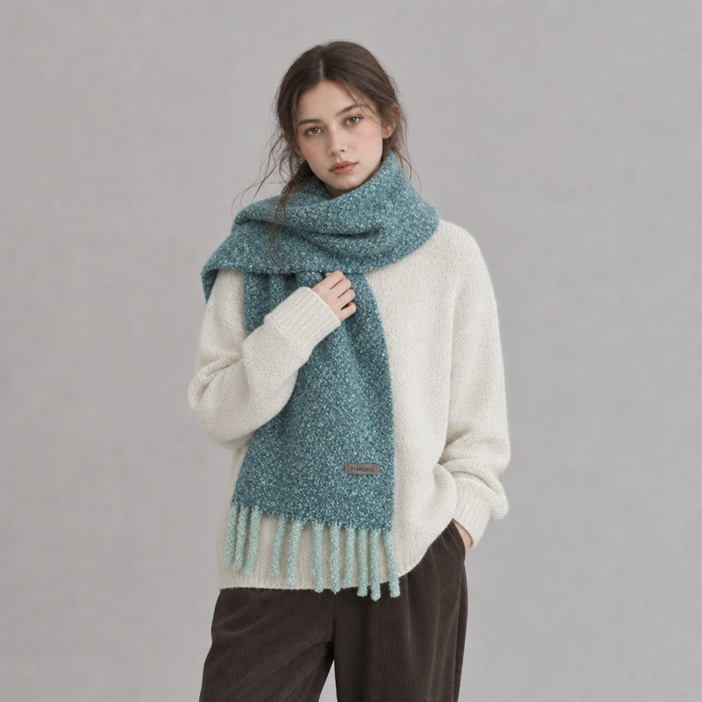 Chunky boucle knit scarf for women, turquoise with long fringe tassels and logo tag