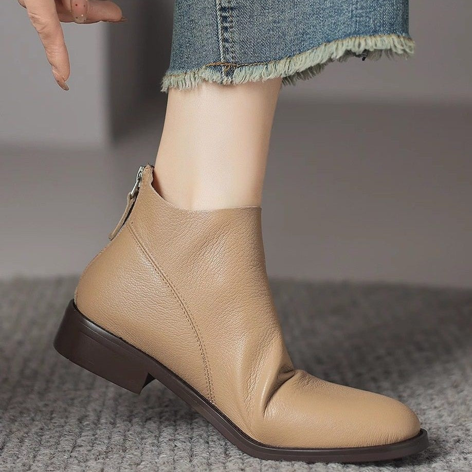 Camel leather ankle boots with low block heel and back zip, side view