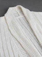 Off-white pointelle knit cardigan fabric detail, open-front drape panels