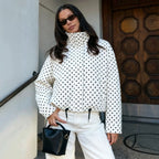 White polka dot cropped puffer jacket with stand collar and zip front