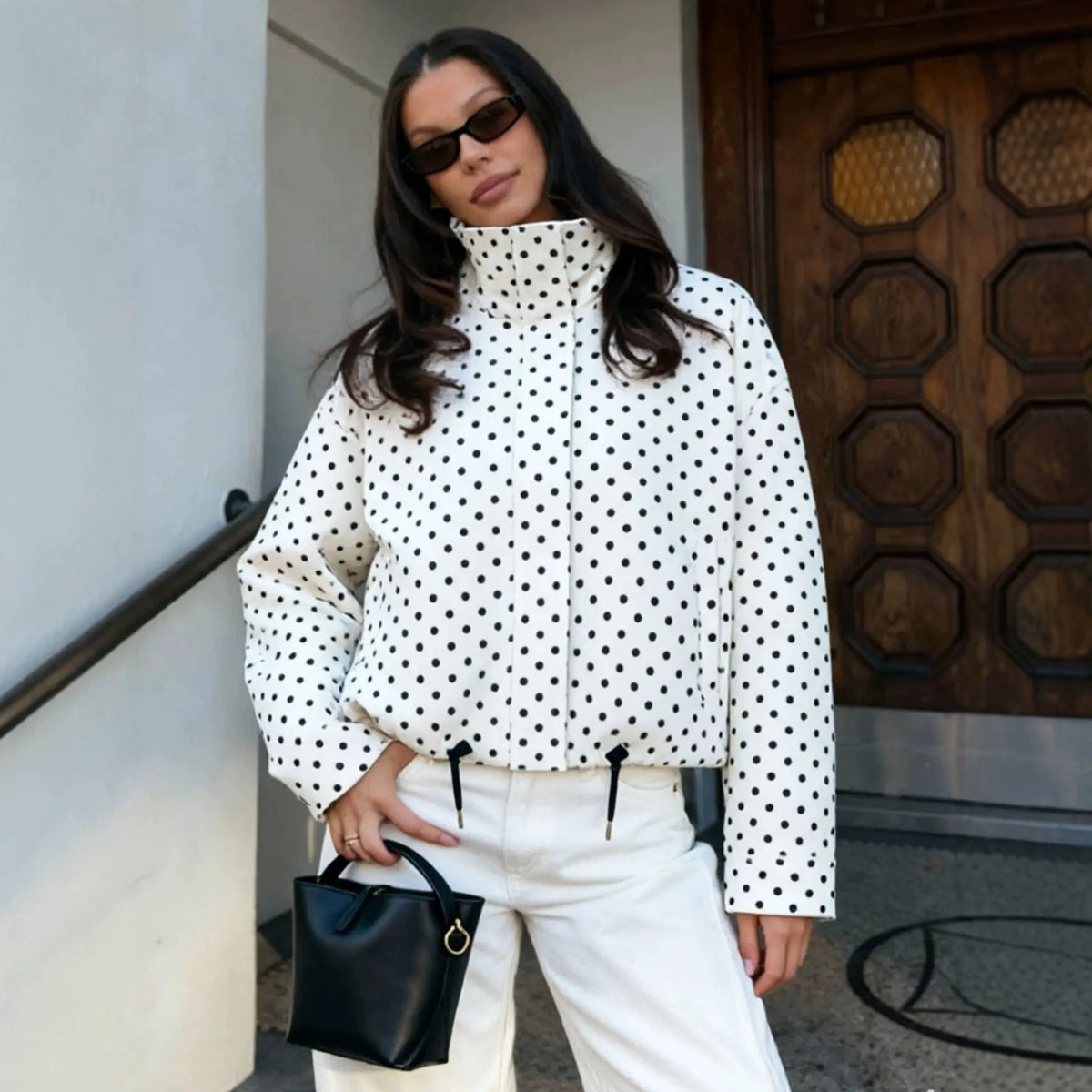 White polka dot cropped puffer jacket with stand collar and zip front