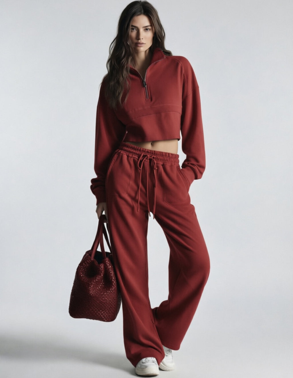 Dark red women's sweatsuit with cropped half-zip sweatshirt and wide-leg drawstring pants