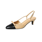 Beige slingback kitten heel pump with cap toe and buckle strap