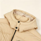 Khaki hooded puffer coat close-up with snap buttons and thick quilted padding