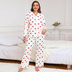 Women’s heart-print pajama set, front view with red hearts on white long-sleeve top and pants