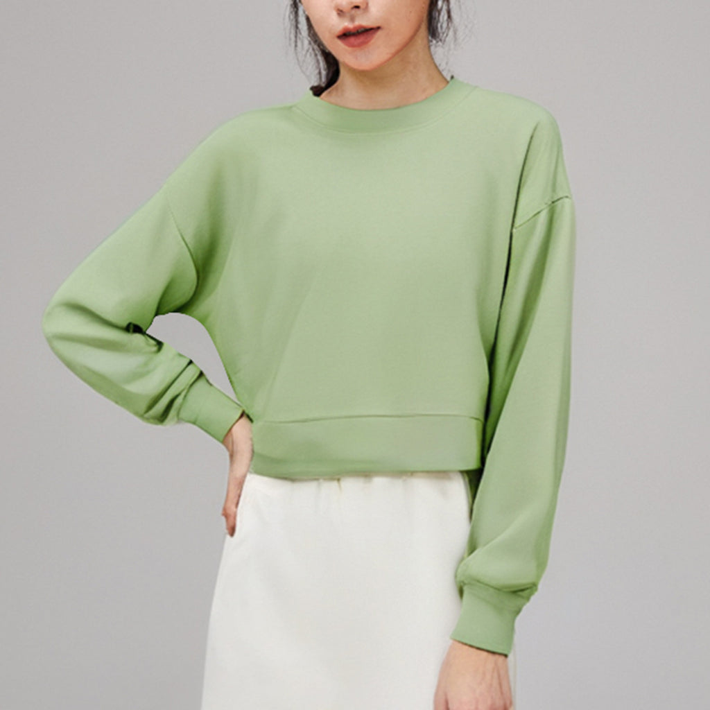 Green cropped crewneck sweatshirt with drop-shoulder long sleeves and ribbed hem