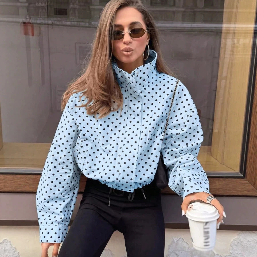 Light blue polka dot cropped puffer jacket with stand collar and zip front