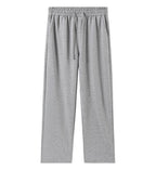 Women’s gray wide-leg sweatpants with drawstring waistband and side pockets