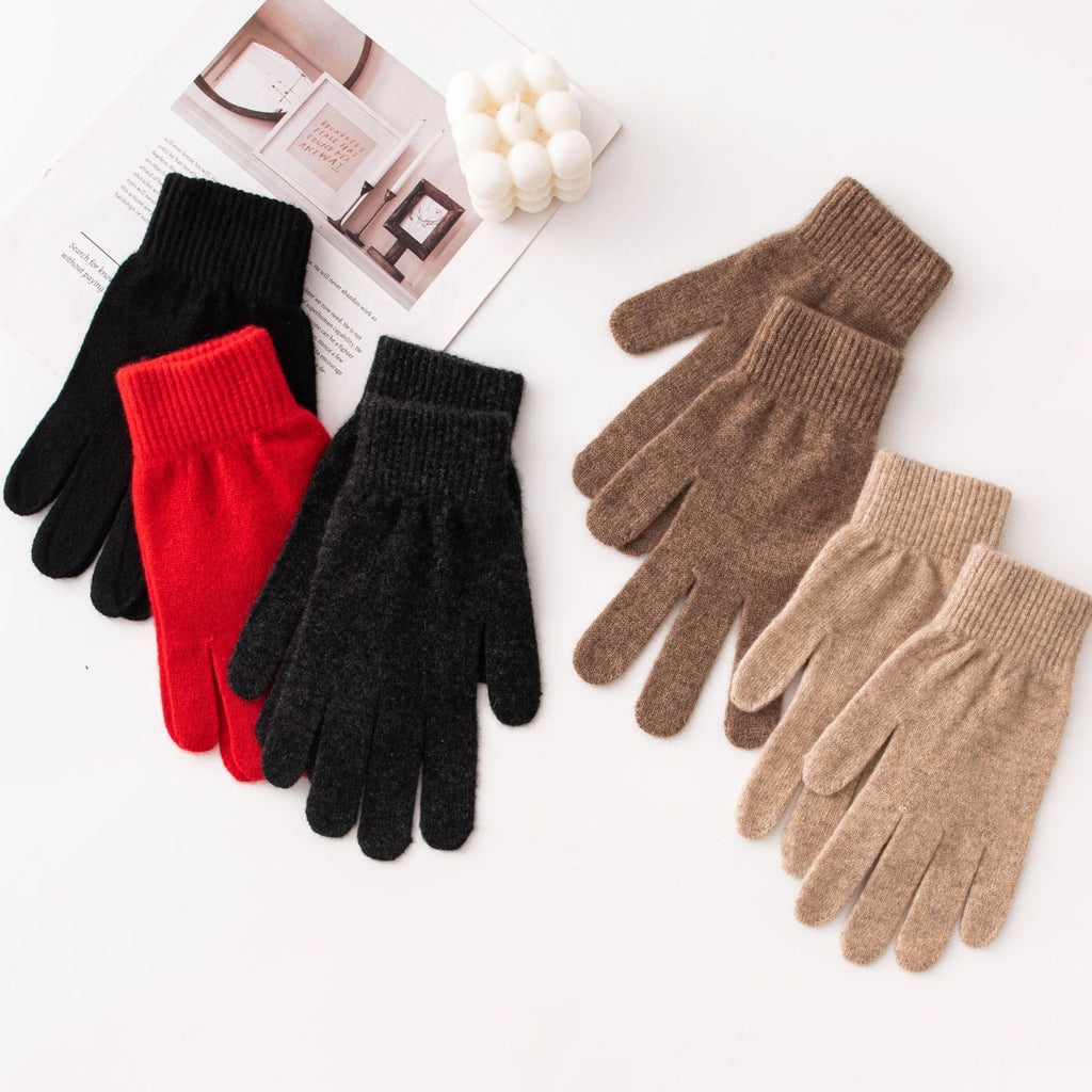 Five pairs of knit winter gloves in black, red, dark gray, brown and camel