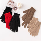 Five pairs of knit winter gloves in black, red, dark gray, brown and camel