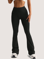 Black high-waist bootcut leggings, front view with waistband and flare hem