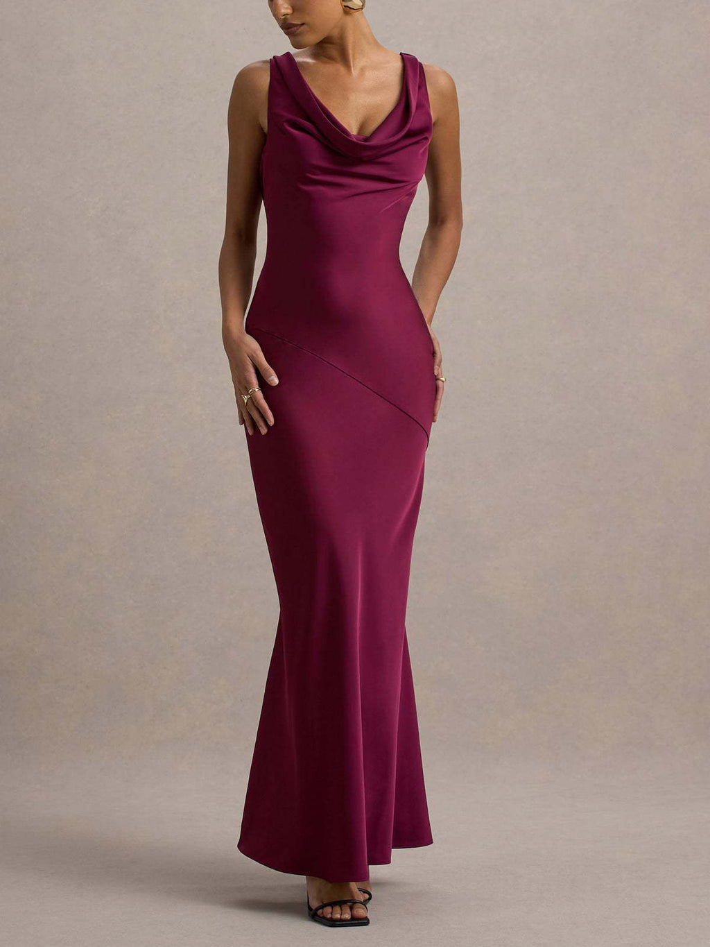 Burgundy satin maxi dress with sleeveless cowl neck and side draped seam.