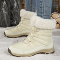 Women’s off-white lace-up snow boots with faux-fur cuffs and lug rubber sole