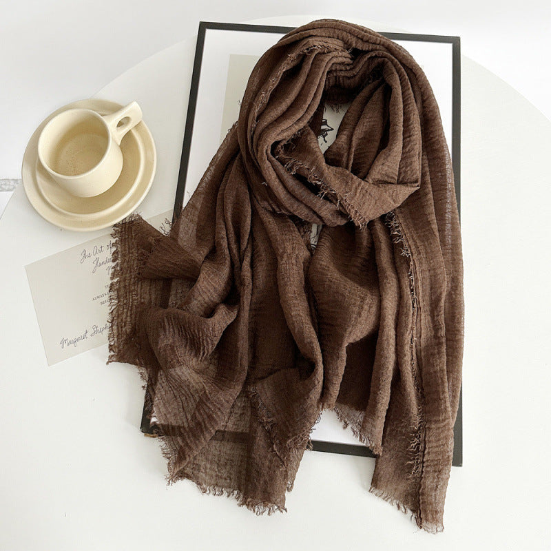 Women’s cotton scarf in dark brown, long crinkle gauze with frayed fringe ends