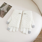 Women’s white fingerless knit gloves with ribbed cuffs and textured wave pattern
