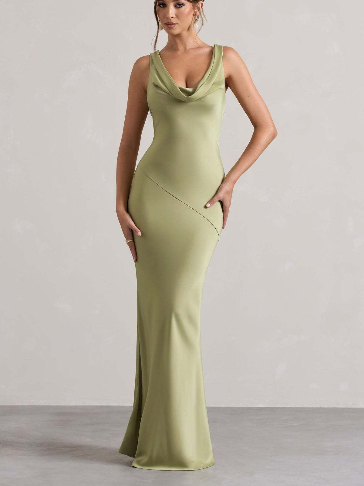 Olive-green satin maxi dress with sleeveless cowl neck and diagonal seam detail.