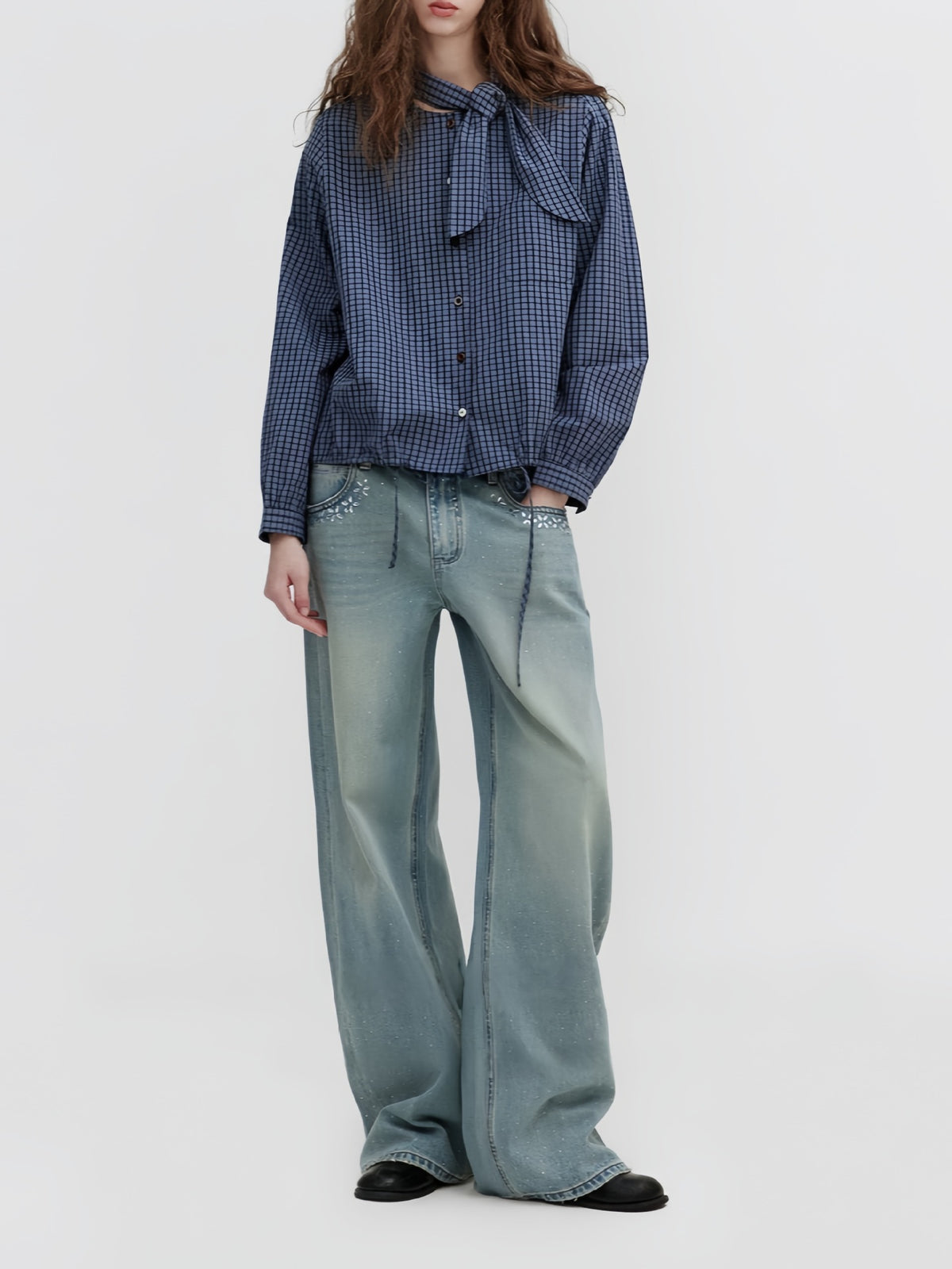 Dark blue plaid tie-neck button-up blouse with button front and balloon sleeves