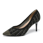 Women’s black knit stiletto pumps with pointed toe and subtle contrast stitching.