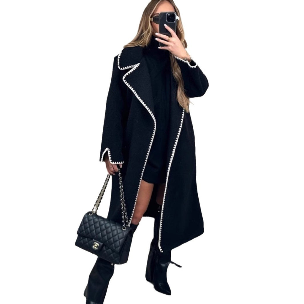 Black long open-front wool coat with contrast trim and wide lapel detail