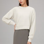 Cream off-white cropped crewneck sweatshirt with drop-shoulder long sleeves