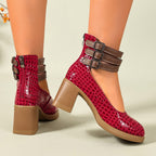 Red croc-embossed platform ankle strap pumps with block heels and triple buckle cuff