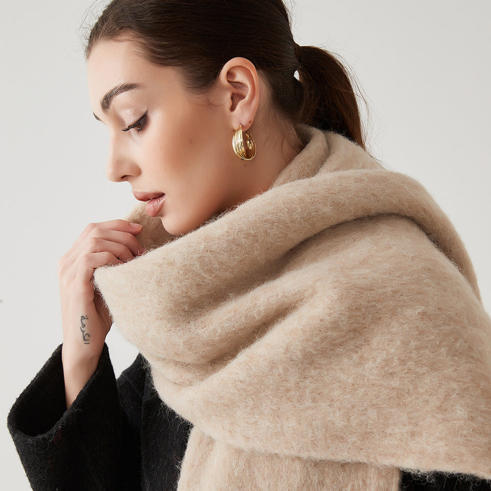Oversized fuzzy mohair-blend scarf with fringe ends, beige taupe, worn draped over shoulders