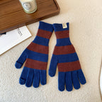 Women’s striped knit gloves in blue and brown with long ribbed cuffs and five-finger design