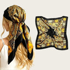 Large satin square scarf in black with gold and cream paisley print, tied head wrap