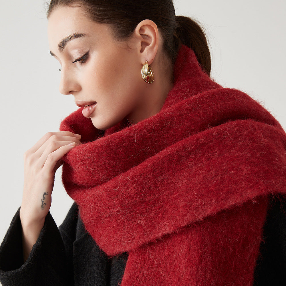 Oversized fuzzy wool-blend scarf in deep red, wide draped wrap around neck