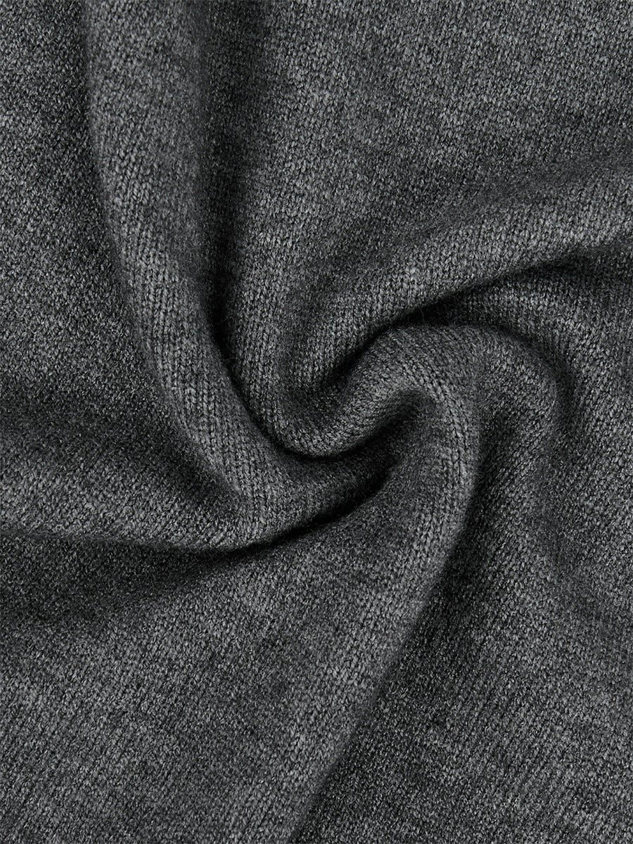 Gray knit fabric close-up with soft texture and subtle heather pattern