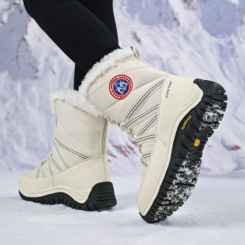 Women’s white lace-up snow boots, faux fur trim and chunky lug sole, mid-calf