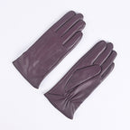 Burgundy leather gloves with three-strap cuffs, fleece-lined winter style.