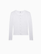 White pointelle knit cardigan with button front and crew neck