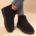 Fur-lined slip-on snow boots, black faux suede with elastic side panels