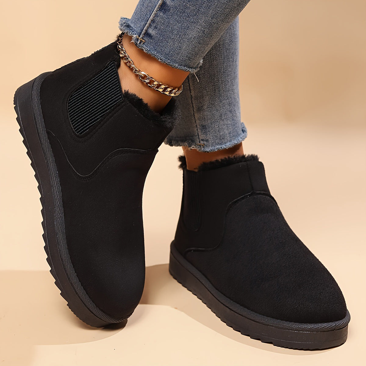 Fur-lined slip-on snow boots, black faux suede with elastic side panels