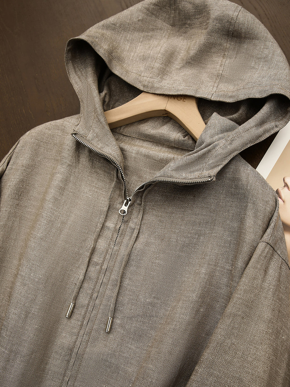 Taupe linen hooded zip-up jacket with drawstring hood and front zipper