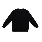Black ribbed crew neck sweater with wide rib knit texture and long sleeves