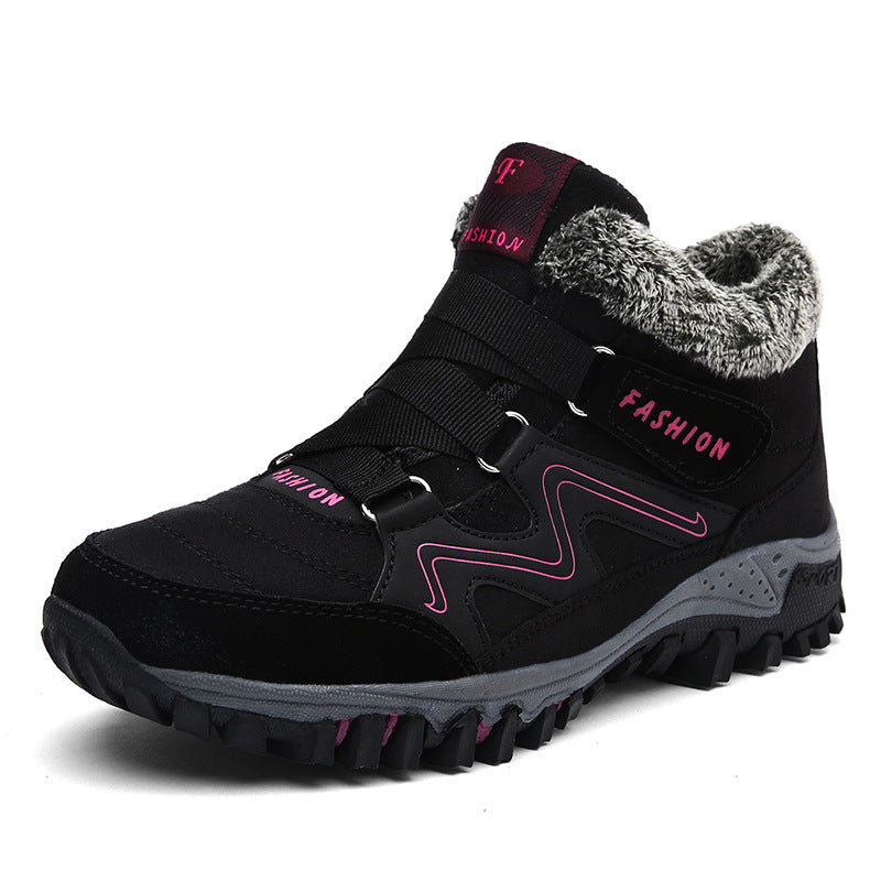 Black snow boots with faux fur lining, hook-and-loop straps, magenta accents, lug sole