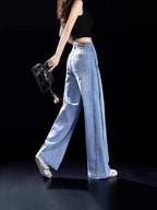 Light blue high-waisted wide-leg jeans with front seams and large back pockets