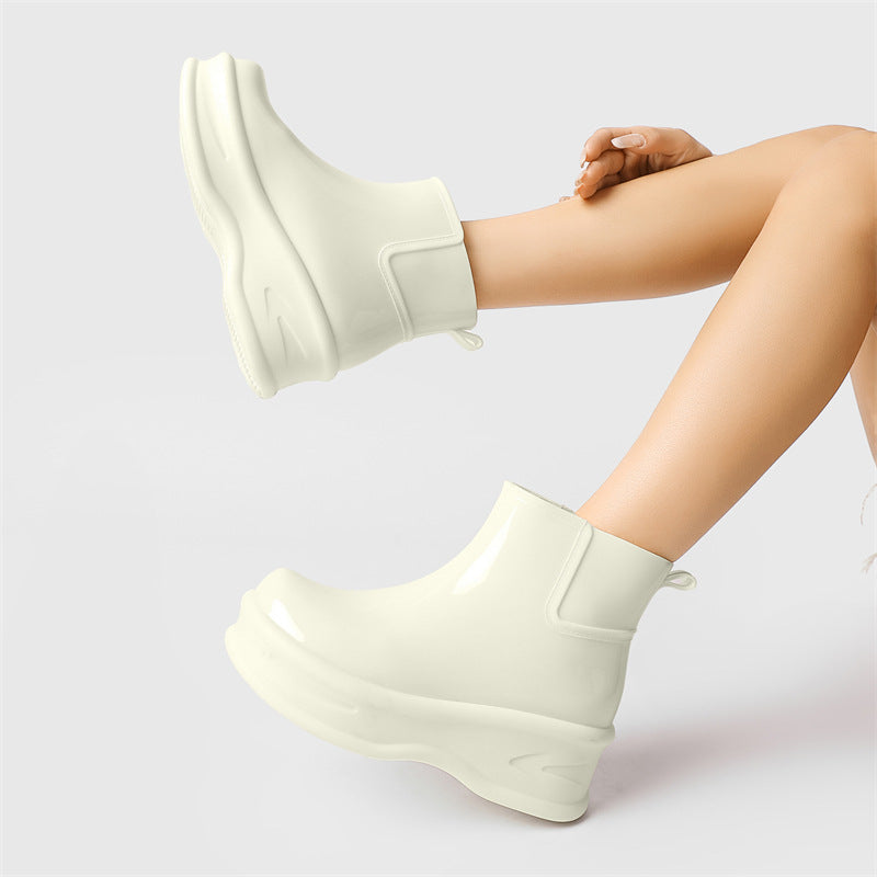 Women's off-white glossy ankle rain boots, chunky platform pull-on style