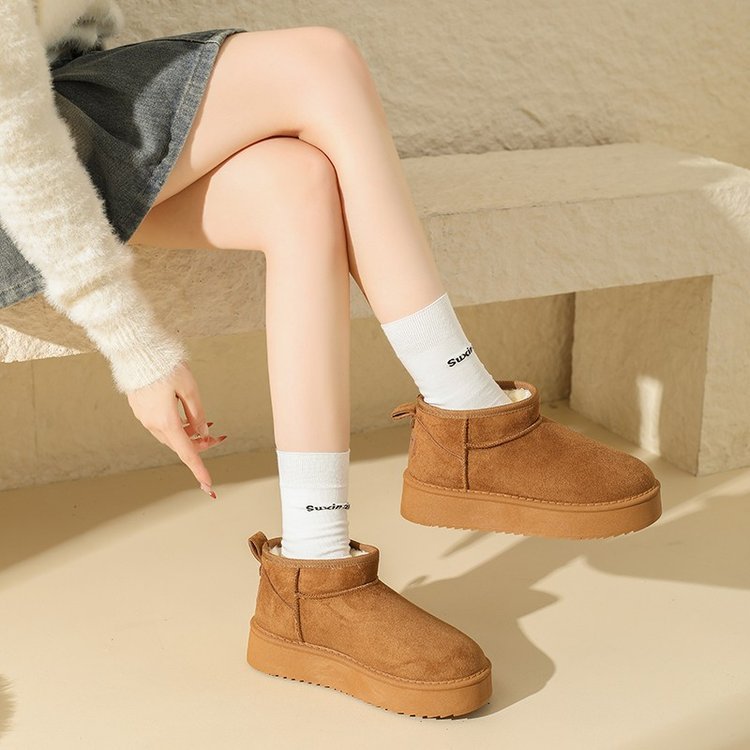 Camel faux suede mini platform snow boots worn with socks