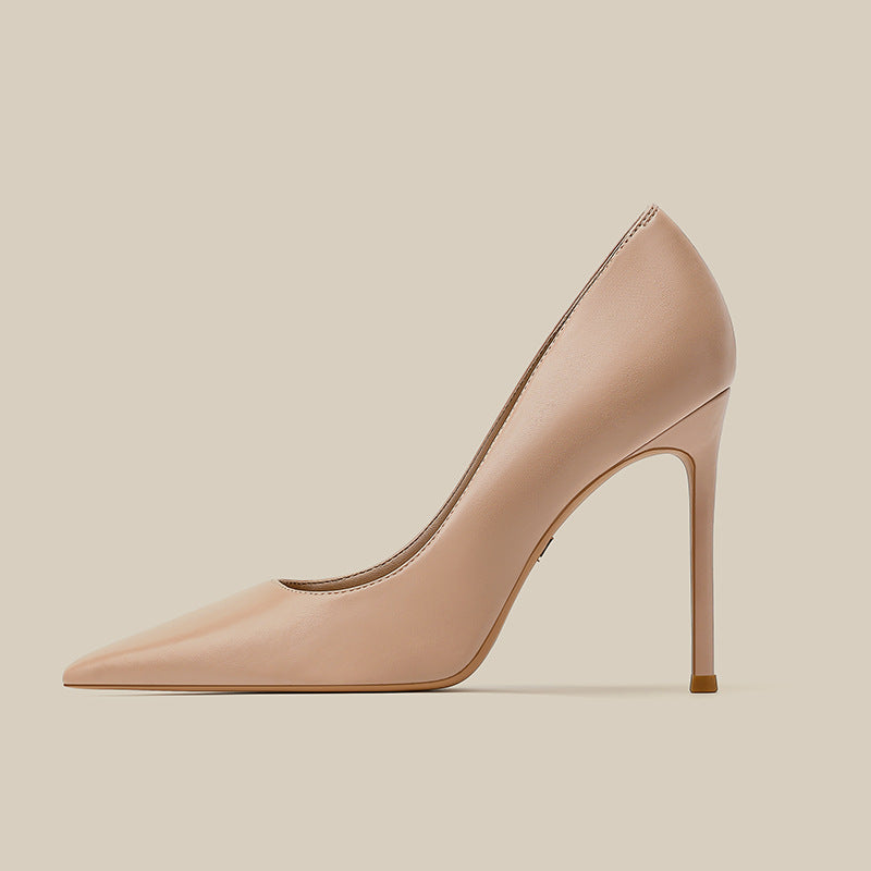 Women’s blush light pink pointed toe stiletto high heels with slender heel, side view