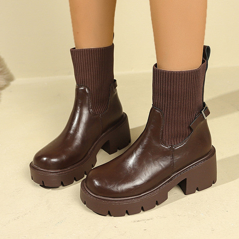 Dark brown ribbed sock-booties with chunky platform heel and lug sole