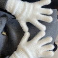 White plush gloves with fuzzy cuff trim, five-finger design