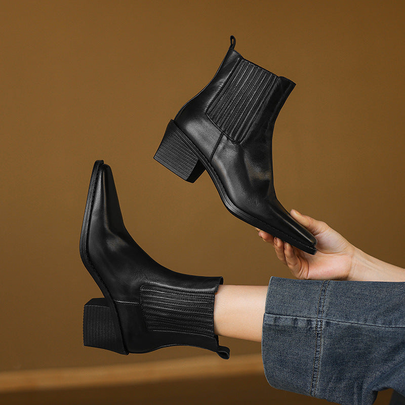 Black square-toe Chelsea pull-on boots with side elastic and stacked block heel